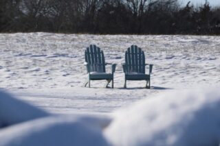 Blue Chairs in Snow. Photo by Jonathan Huggon.