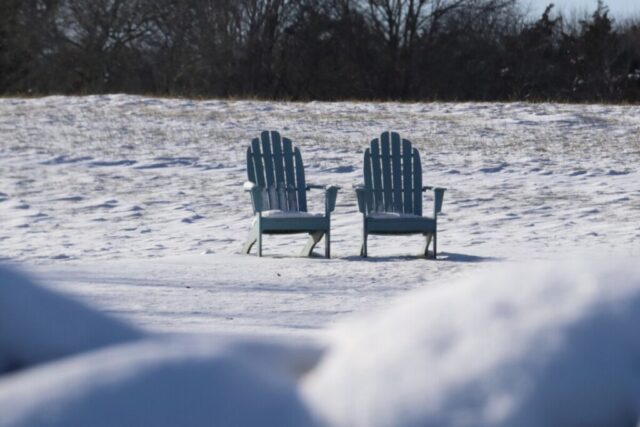 Blue Chairs in Snow. Photo by Jonathan Huggon.